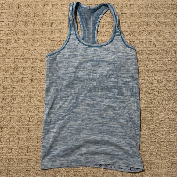 lululemon athletica Tops - EUC Light blue Lululemon Sweat wicking tank size M
